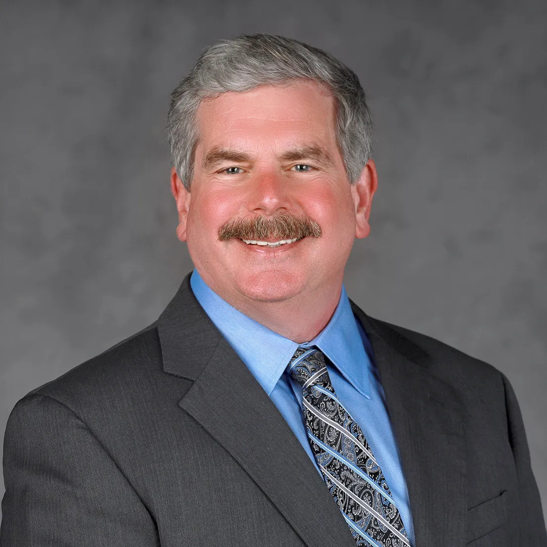Headshot of David L. DeRegis