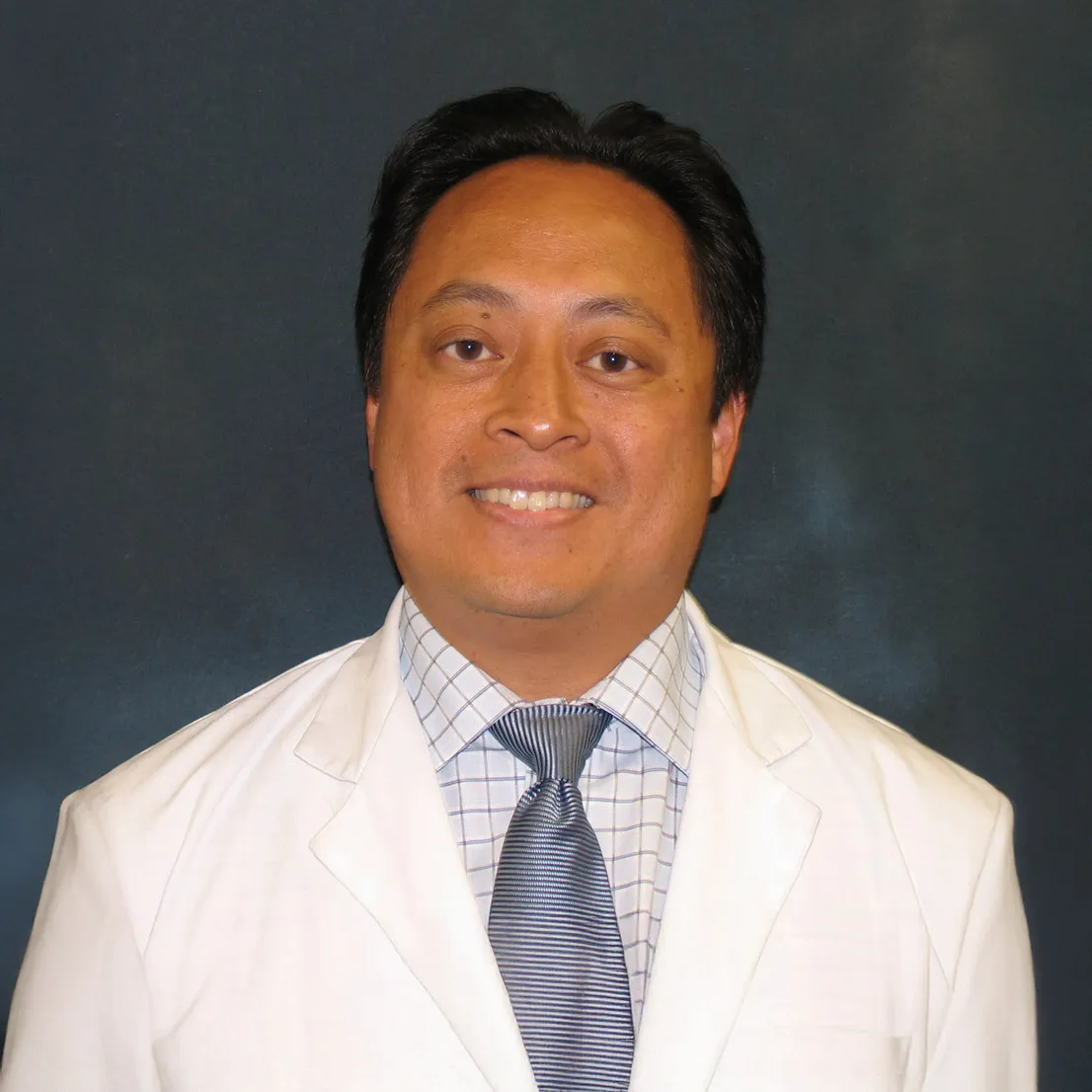 Heashot of John M. Lazaro